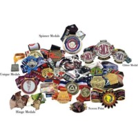 A diverse assortment of medals, including spinner, glitter, unique, hinge, and screen print designs, displayed against a neutral background.